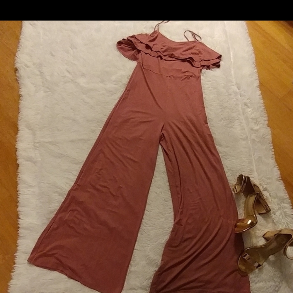- Brand new jumpsuit without tags